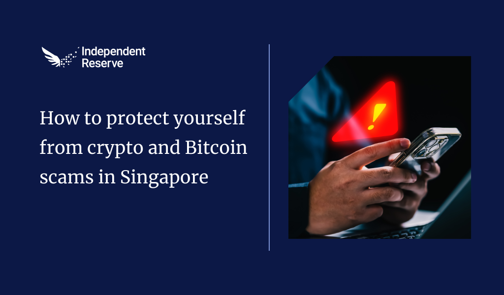 A blog graphic from Independent Reserve titled “How to protect yourself from crypto and Bitcoin scams in Singapore.” On the right, a person holds a smartphone displaying a red warning symbol with an exclamation mark, suggesting scam or fraud alert. The design uses a dark blue background with professional branding.