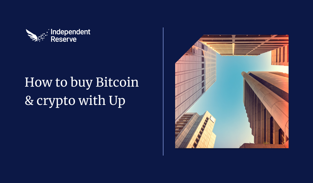 A dark blue graphic with the Independent Reserve logo in the top left corner. White text reads “How to buy Bitcoin & crypto with Up.” On the right, there’s a square photo of tall city buildings shot from below, looking up at the sky with a warm orange and blue gradient.